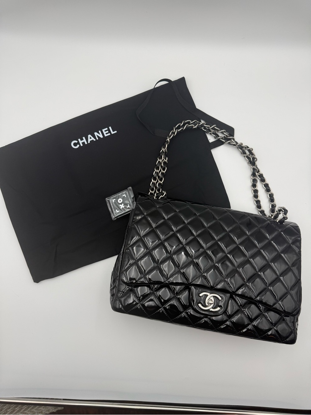 CHANEL Black Quilted Patent Leather Double Flap Jumbo Bag with Chain